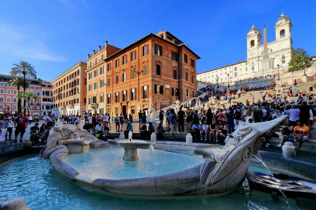 The Fountain of the Old Boat, a charming landmark in Rome with intricate sculptures