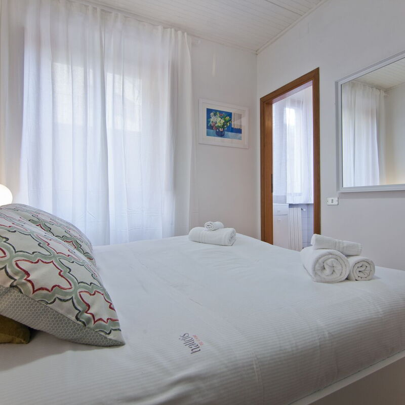 Flaminia: Bedroom with bathroom ensuite . The bedroom and bathroom face an internal street.