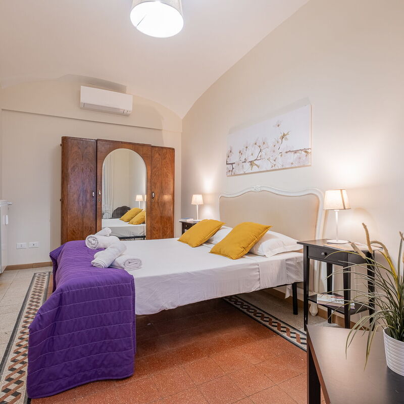 Merulana House: chambre à coucher