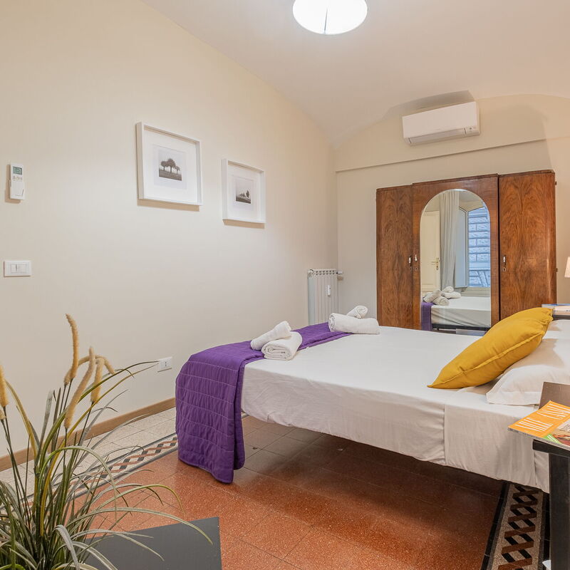 Merulana House: chambre à coucher