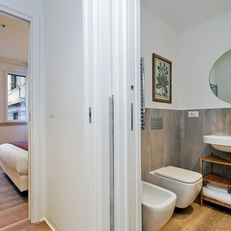 La Flavia City Suites By Halldis: Bathroom & Bedroom