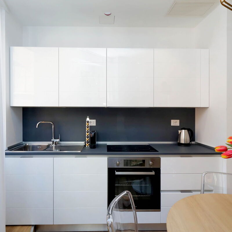 La Flavia City Suites By Halldis: wall equipped with kitchenette