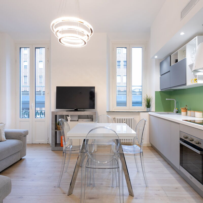 Bartolini Modern 2 Bedrooms by Halldis: Dining Room, Kitchen, Living Room