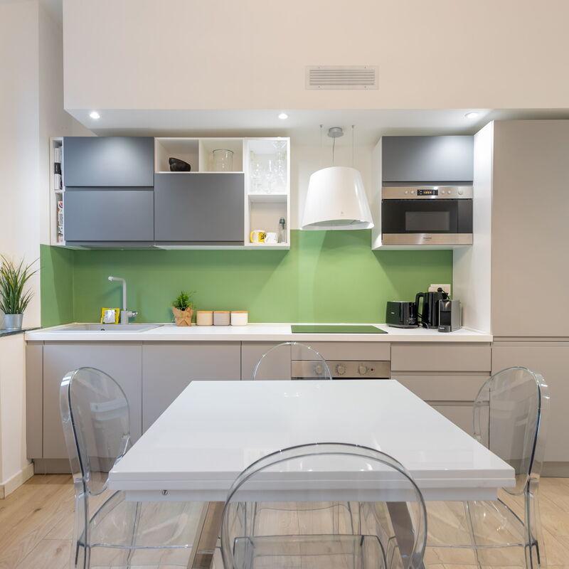 Bartolini Modern 2 Bedrooms by Halldis: Dining Room, Kitchen, Living Room