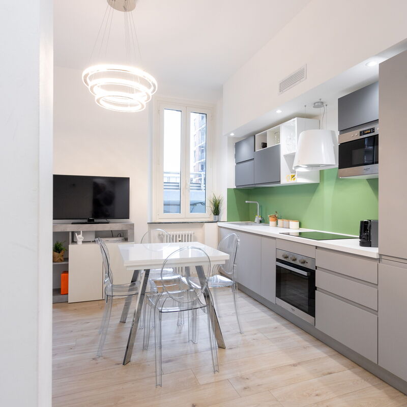 Bartolini Modern 2 Bedrooms by Halldis: Dining Room, Kitchen, Living Room