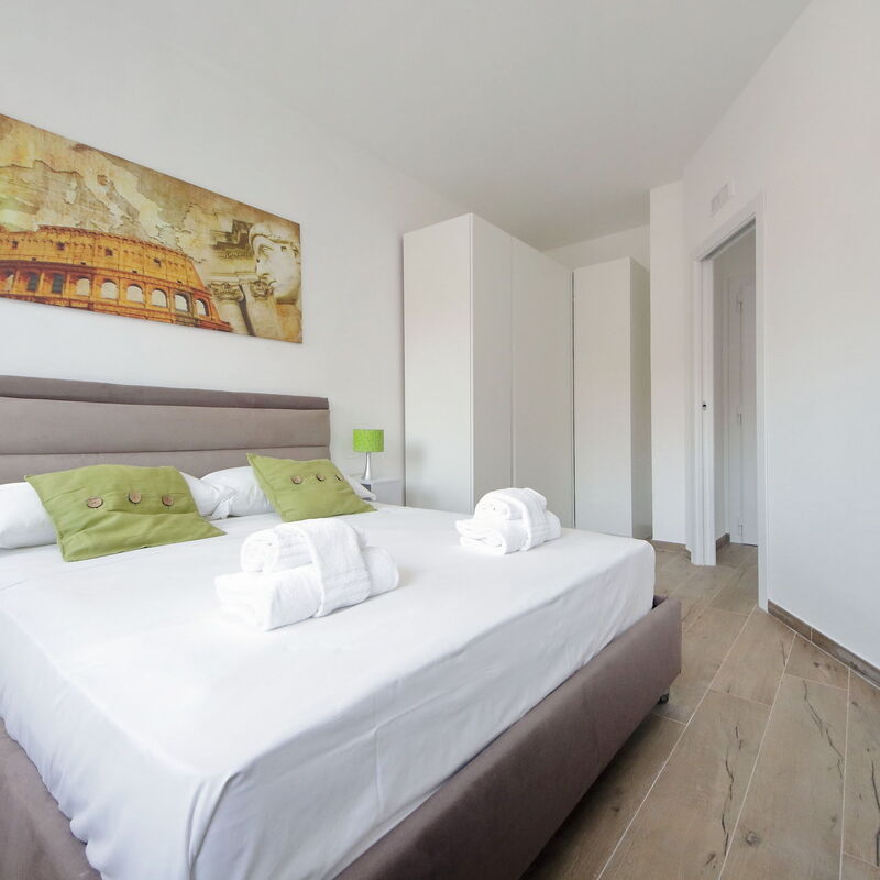 Via Appia New Modern Flat - Near Metro San Giovanni: chambre à coucher
