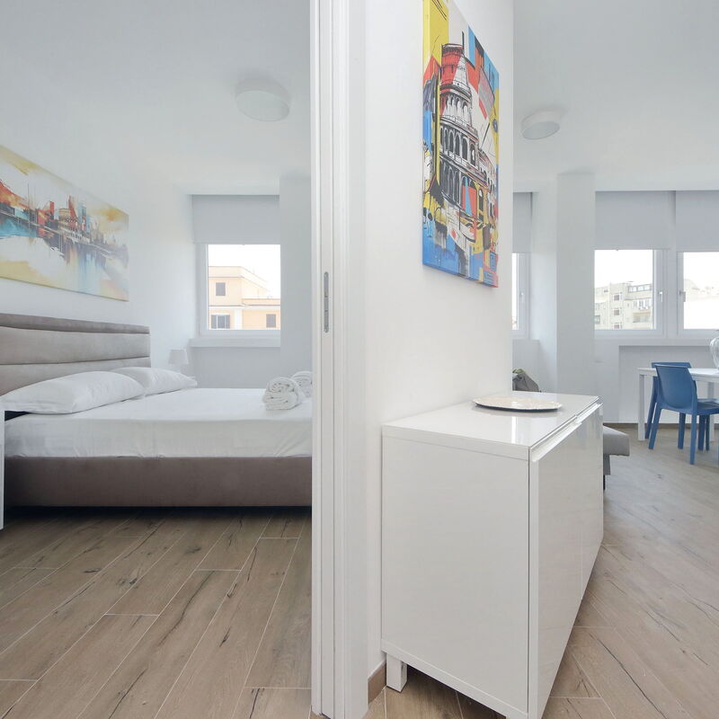 New Via Appia 1Bdr - Near Metro San Giovanni: chambre à coucher, Salon