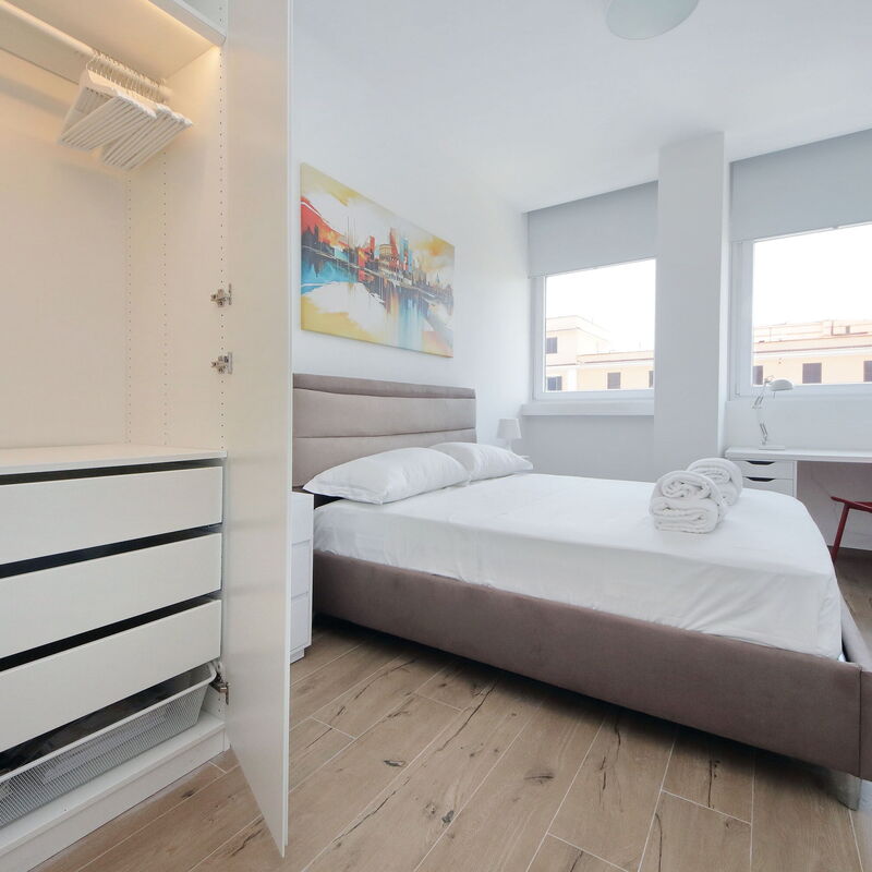 New Via Appia 1Bdr - Near Metro San Giovanni: chambre à coucher